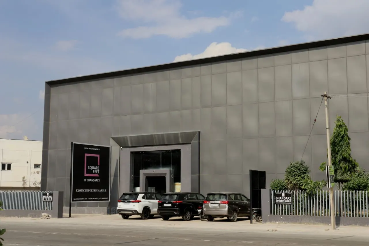 Professional marble supplier team at Kishangarh stockyard evaluating premium marble quality